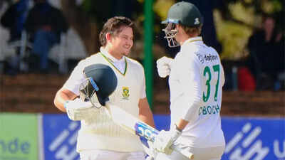 Lhuan-dre Pretorius celebrates his record-breaking innings with Corbin Bosch